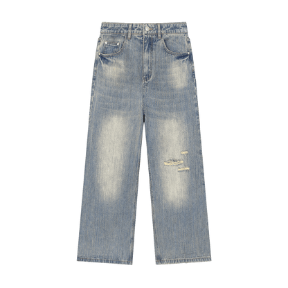 Unisex vintage wash distressed denim jeans from ODMPOD featuring a relaxed fit and faded, worn-in look.