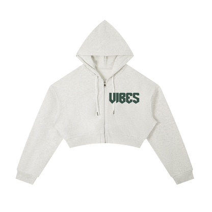 ODMPOD Vibes cropped zip-up hoodie in black, featuring a front zipper and casual fit, shown on a model.